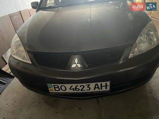 Сірий Міцубісі Lancer, об'ємом двигуна 1.6 л та пробігом 330 тис. км за 3500 $, фото 1 на Automoto.ua