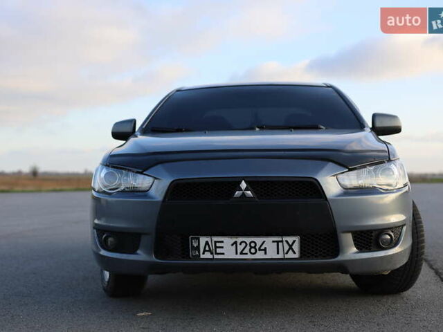 Серый Мицубиси Лансер, объемом двигателя 1.5 л и пробегом 330 тыс. км за 5250 $, фото 1 на Automoto.ua