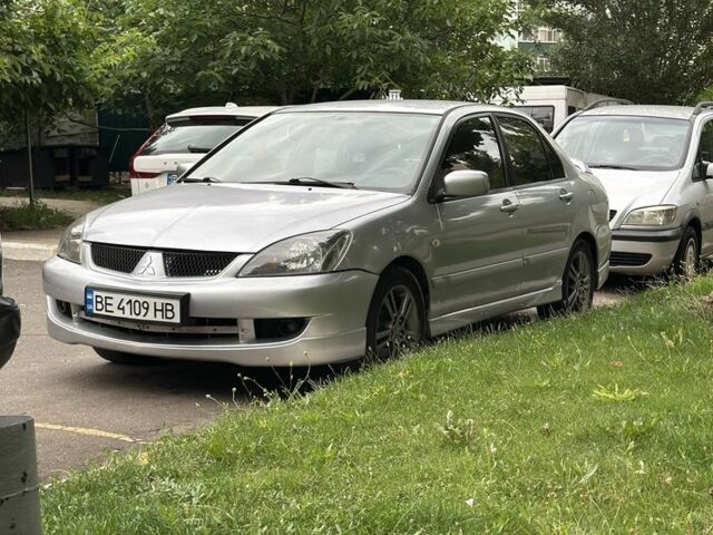 Сірий Міцубісі Lancer, об'ємом двигуна 2 л та пробігом 202 тис. км за 4497 $, фото 1 на Automoto.ua
