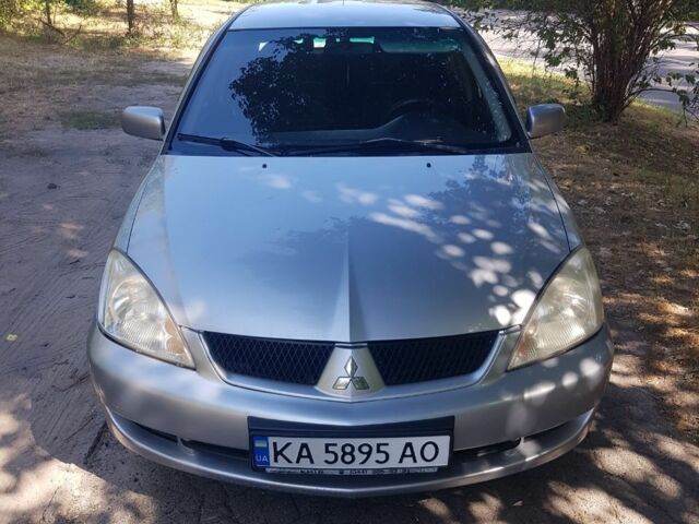 Сірий Міцубісі Lancer, об'ємом двигуна 1.6 л та пробігом 236 тис. км за 4500 $, фото 1 на Automoto.ua