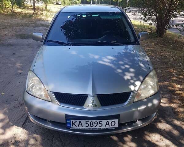 Серый Мицубиси Лансер, объемом двигателя 0 л и пробегом 236 тыс. км за 4500 $, фото 1 на Automoto.ua