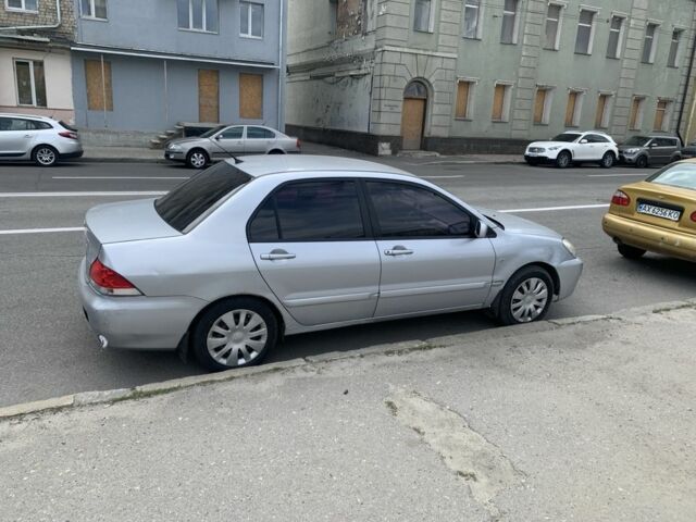 Сірий Міцубісі Lancer, об'ємом двигуна 1.6 л та пробігом 332 тис. км за 3200 $, фото 1 на Automoto.ua