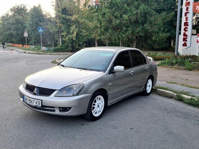 Сірий Міцубісі Lancer, об'ємом двигуна 2 л та пробігом 293 тис. км за 3999 $, фото 1 на Automoto.ua