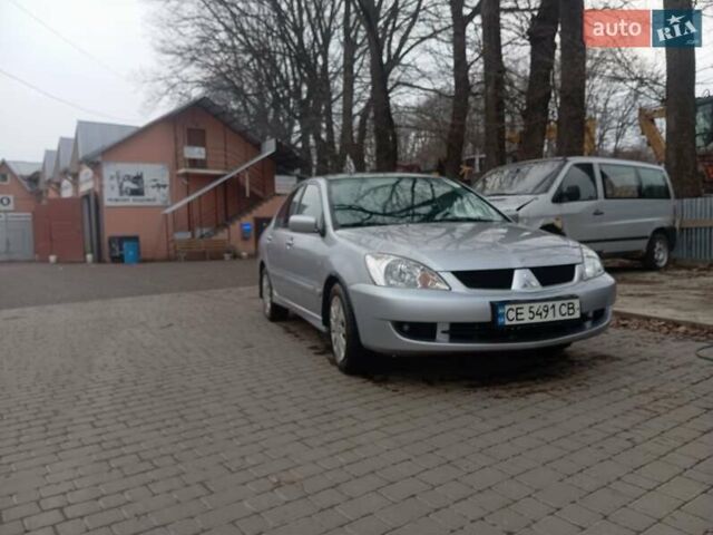 Серый Мицубиси Лансер, объемом двигателя 1.6 л и пробегом 175 тыс. км за 4200 $, фото 1 на Automoto.ua