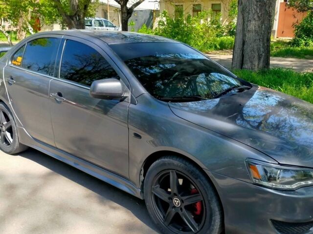 Сірий Міцубісі Lancer, об'ємом двигуна 2 л та пробігом 355 тис. км за 7000 $, фото 1 на Automoto.ua
