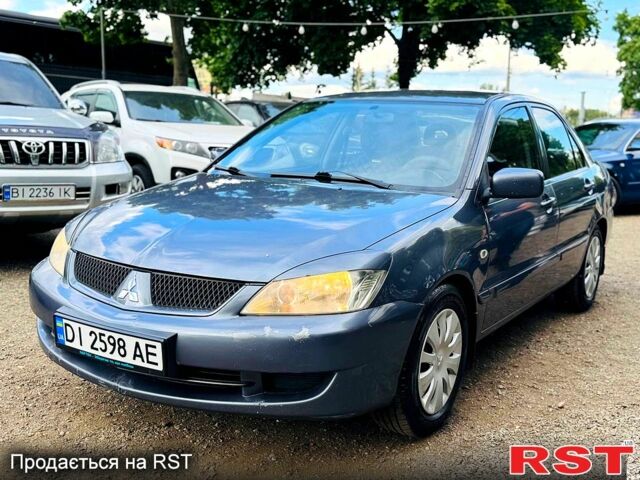 Сірий Міцубісі Lancer, об'ємом двигуна 1.6 л та пробігом 123 тис. км за 3600 $, фото 1 на Automoto.ua