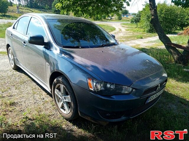 Сірий Міцубісі Lancer, об'ємом двигуна 2 л та пробігом 236 тис. км за 7500 $, фото 1 на Automoto.ua