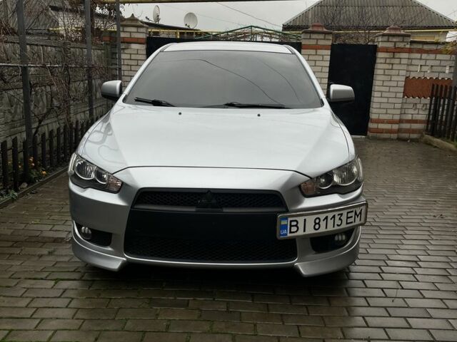 Сірий Міцубісі Lancer, об'ємом двигуна 2 л та пробігом 230 тис. км за 6400 $, фото 1 на Automoto.ua