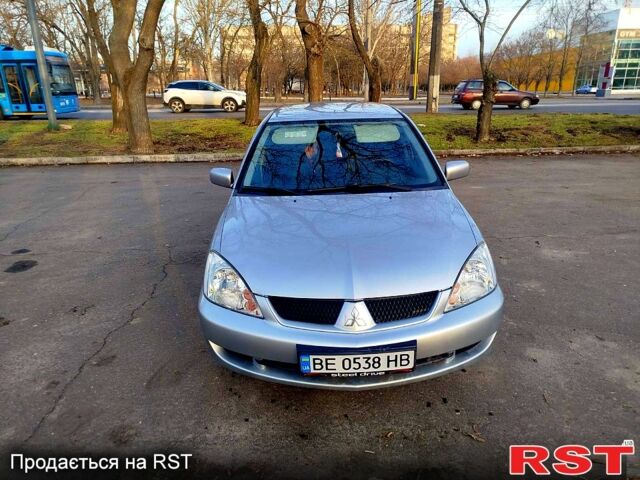 Сірий Міцубісі Lancer, об'ємом двигуна 1.6 л та пробігом 300 тис. км за 4200 $, фото 1 на Automoto.ua