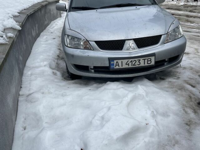 Сірий Міцубісі Lancer, об'ємом двигуна 1.6 л та пробігом 273 тис. км за 2700 $, фото 1 на Automoto.ua