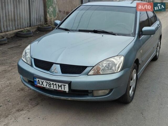 Сірий Міцубісі Lancer, об'ємом двигуна 1.58 л та пробігом 306 тис. км за 3400 $, фото 1 на Automoto.ua
