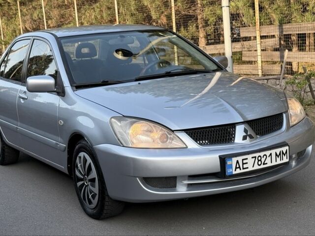Сірий Міцубісі Lancer, об'ємом двигуна 1.5 л та пробігом 255 тис. км за 4317 $, фото 1 на Automoto.ua