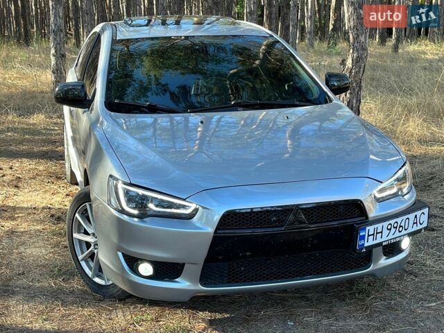 Серый Мицубиси Лансер, объемом двигателя 2 л и пробегом 298 тыс. км за 7000 $, фото 1 на Automoto.ua