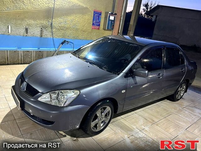 Сірий Міцубісі Lancer, об'ємом двигуна 1.6 л та пробігом 0 тис. км за 4200 $, фото 1 на Automoto.ua