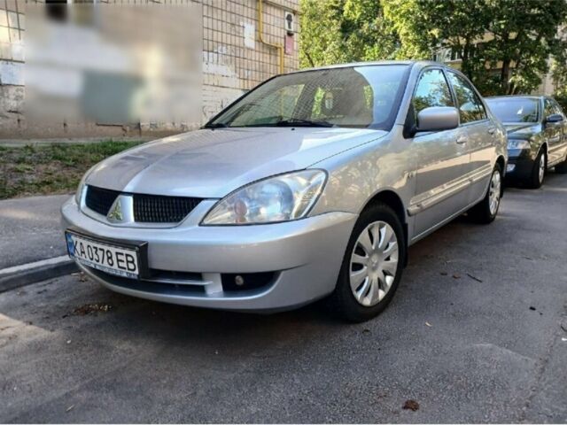 Сірий Міцубісі Lancer, об'ємом двигуна 1.58 л та пробігом 170 тис. км за 4600 $, фото 1 на Automoto.ua