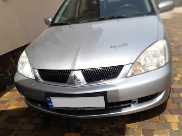 Сірий Міцубісі Lancer, об'ємом двигуна 1.5 л та пробігом 176 тис. км за 2950 $, фото 1 на Automoto.ua