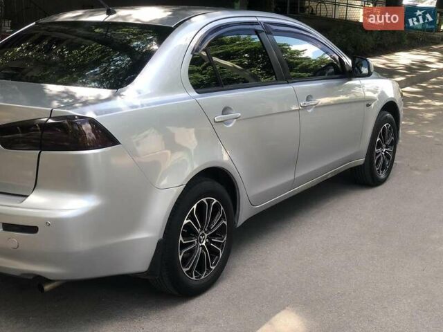 Сірий Міцубісі Lancer, об'ємом двигуна 1.5 л та пробігом 220 тис. км за 5700 $, фото 1 на Automoto.ua