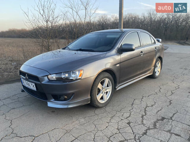 Сірий Міцубісі Lancer, об'ємом двигуна 2 л та пробігом 205 тис. км за 7000 $, фото 1 на Automoto.ua