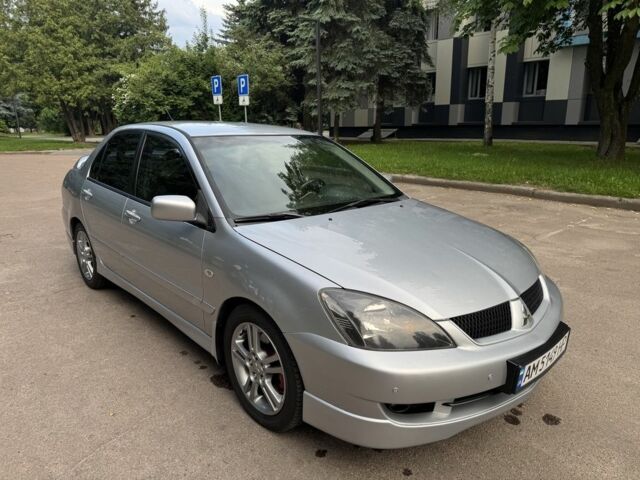Серый Мицубиси Лансер, объемом двигателя 2 л и пробегом 202 тыс. км за 4800 $, фото 1 на Automoto.ua