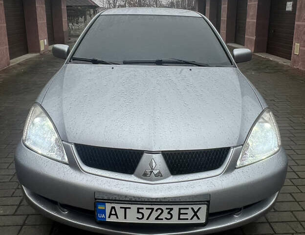 Серый Мицубиси Лансер, объемом двигателя 1.6 л и пробегом 254 тыс. км за 4500 $, фото 1 на Automoto.ua