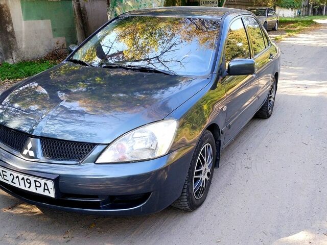 Сірий Міцубісі Lancer, об'ємом двигуна 1.6 л та пробігом 300 тис. км за 4300 $, фото 1 на Automoto.ua