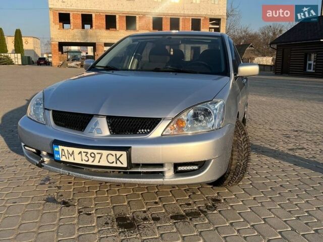 Сірий Міцубісі Lancer, об'ємом двигуна 1.6 л та пробігом 206 тис. км за 3499 $, фото 1 на Automoto.ua