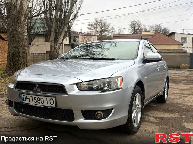 Серый Мицубиси Лансер, объемом двигателя 1.5 л и пробегом 202 тыс. км за 5400 $, фото 1 на Automoto.ua