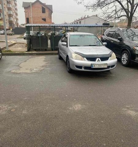 Сірий Міцубісі Lancer, об'ємом двигуна 1.6 л та пробігом 369 тис. км за 3200 $, фото 1 на Automoto.ua