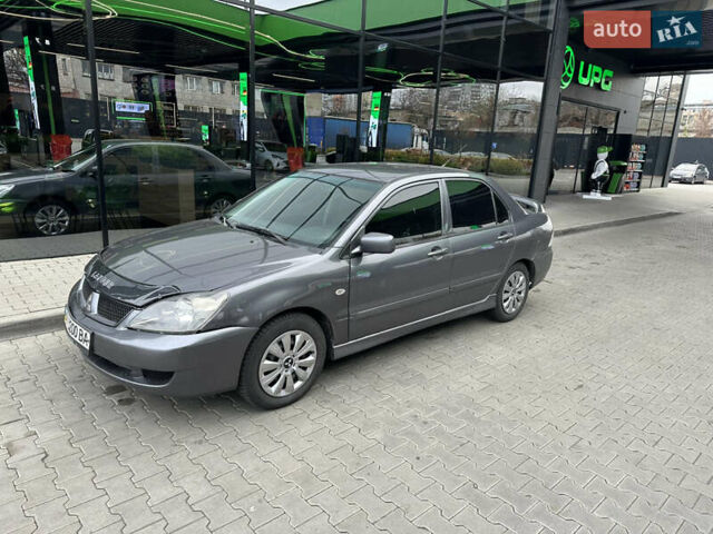 Сірий Міцубісі Lancer, об'ємом двигуна 1.6 л та пробігом 115 тис. км за 2800 $, фото 1 на Automoto.ua