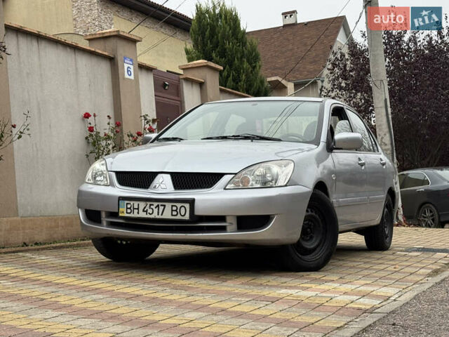 Сірий Міцубісі Lancer, об'ємом двигуна 1.6 л та пробігом 221 тис. км за 3650 $, фото 1 на Automoto.ua