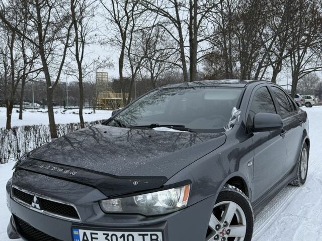 Серый Мицубиси Лансер, объемом двигателя 2 л и пробегом 250 тыс. км за 6300 $, фото 1 на Automoto.ua