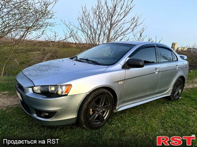 Сірий Міцубісі Lancer, об'ємом двигуна 2 л та пробігом 138 тис. км за 5500 $, фото 1 на Automoto.ua