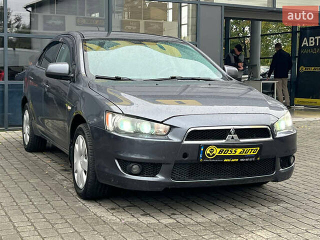 Серый Мицубиси Лансер, объемом двигателя 1.5 л и пробегом 239 тыс. км за 6000 $, фото 1 на Automoto.ua