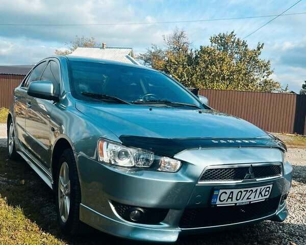 Сірий Міцубісі Lancer, об'ємом двигуна 2 л та пробігом 212 тис. км за 7300 $, фото 1 на Automoto.ua