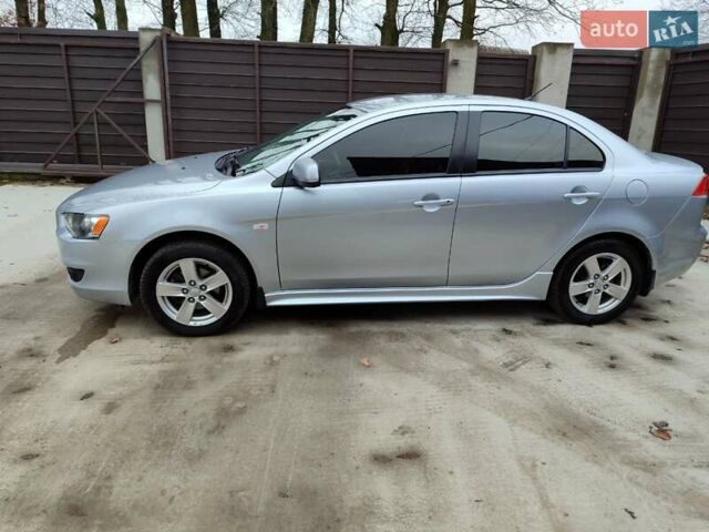 Серый Мицубиси Лансер, объемом двигателя 2 л и пробегом 234 тыс. км за 7200 $, фото 1 на Automoto.ua