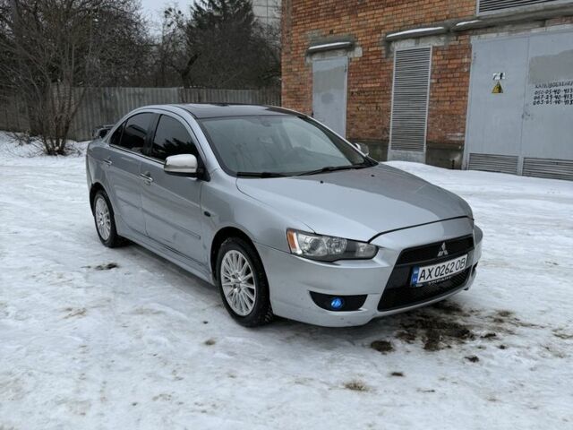 Серый Мицубиси Лансер, объемом двигателя 2 л и пробегом 239 тыс. км за 4750 $, фото 1 на Automoto.ua