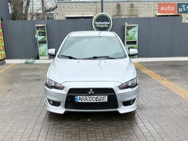 Серый Мицубиси Лансер, объемом двигателя 2 л и пробегом 212 тыс. км за 6100 $, фото 1 на Automoto.ua