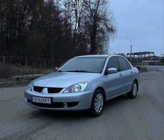 Сірий Міцубісі Lancer, об'ємом двигуна 1.6 л та пробігом 180 тис. км за 3900 $, фото 1 на Automoto.ua