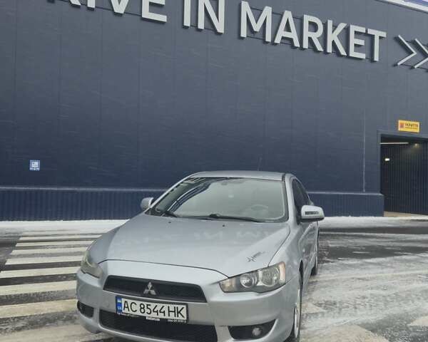 Серый Мицубиси Лансер, объемом двигателя 2 л и пробегом 240 тыс. км за 5900 $, фото 1 на Automoto.ua