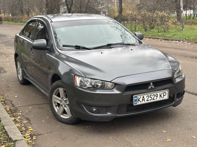 Серый Мицубиси Лансер, объемом двигателя 2 л и пробегом 240 тыс. км за 5450 $, фото 1 на Automoto.ua