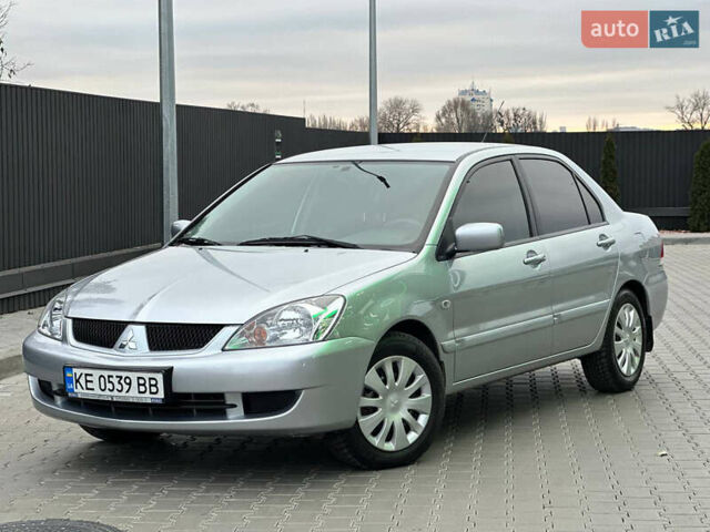 Серый Мицубиси Лансер, объемом двигателя 1.58 л и пробегом 34 тыс. км за 7500 $, фото 1 на Automoto.ua