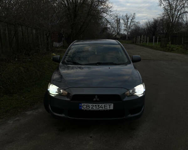 Серый Мицубиси Лансер, объемом двигателя 1.5 л и пробегом 255 тыс. км за 6500 $, фото 1 на Automoto.ua