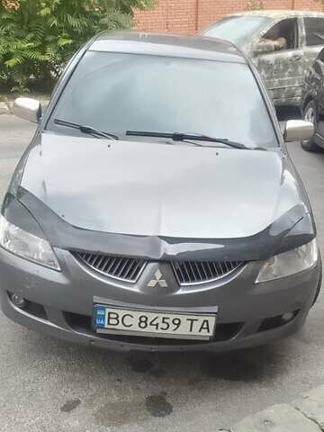 Сірий Міцубісі Lancer, об'ємом двигуна 1.58 л та пробігом 323 тис. км за 3300 $, фото 1 на Automoto.ua