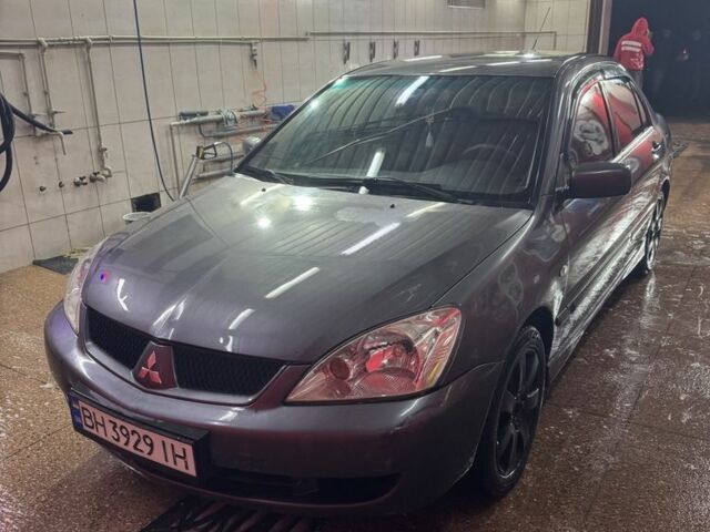 Сірий Міцубісі Lancer, об'ємом двигуна 1.6 л та пробігом 269 тис. км за 4600 $, фото 1 на Automoto.ua