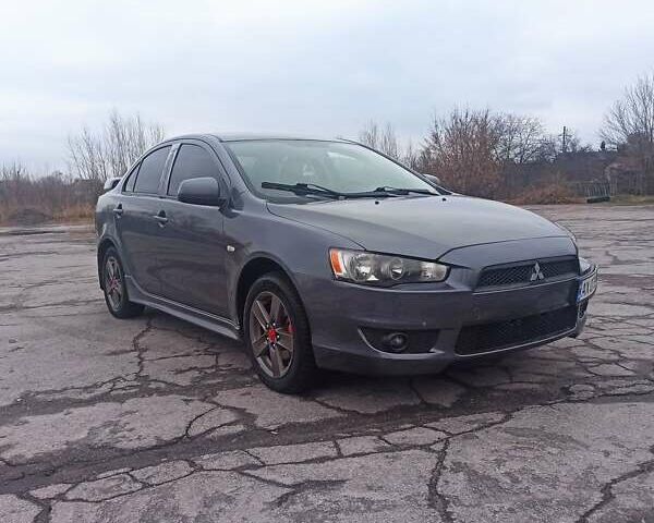 Серый Мицубиси Лансер, объемом двигателя 2 л и пробегом 191 тыс. км за 6400 $, фото 1 на Automoto.ua