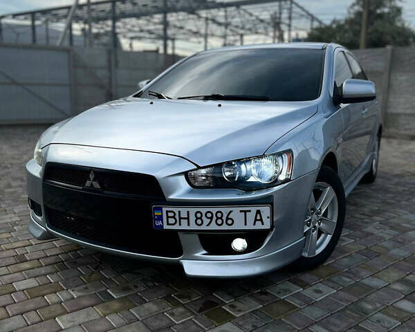 Сірий Міцубісі Lancer, об'ємом двигуна 2 л та пробігом 238 тис. км за 6400 $, фото 1 на Automoto.ua