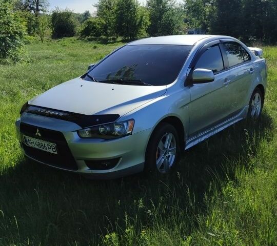 Сірий Міцубісі Lancer, об'ємом двигуна 2 л та пробігом 138 тис. км за 6999 $, фото 1 на Automoto.ua