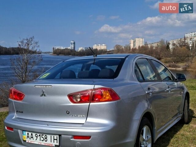 Серый Мицубиси Лансер, объемом двигателя 2 л и пробегом 225 тыс. км за 8500 $, фото 1 на Automoto.ua