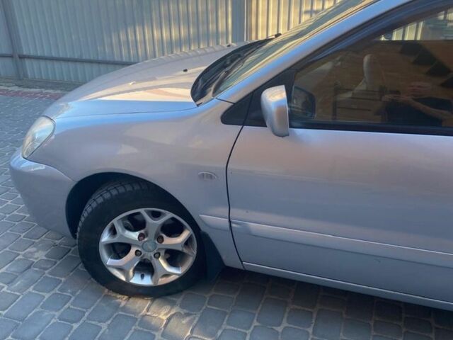 Сірий Міцубісі Lancer, об'ємом двигуна 1.6 л та пробігом 242 тис. км за 4500 $, фото 1 на Automoto.ua