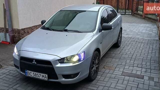 Серый Мицубиси Лансер, объемом двигателя 1.5 л и пробегом 230 тыс. км за 6300 $, фото 1 на Automoto.ua